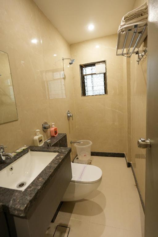 Koupelna v ubytování Hotel Sai Kamal