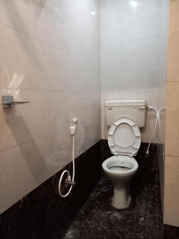 Koupelna v ubytování Raghunandan Residency