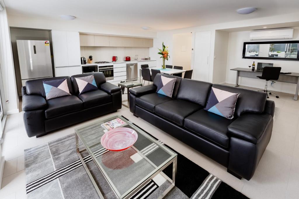 Posezení v ubytování Hamilton Executive Apartments