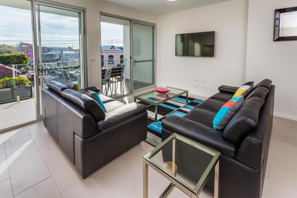 Posezení v ubytování Hamilton Executive Apartments