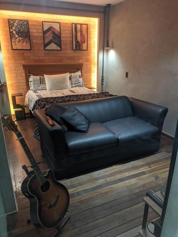 Et opholdsområde på Excellent Studio in Caiçara