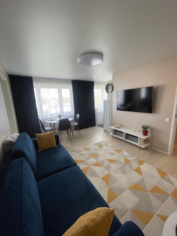 TV a/nebo společenská místnost v ubytování Like a home Voidu
