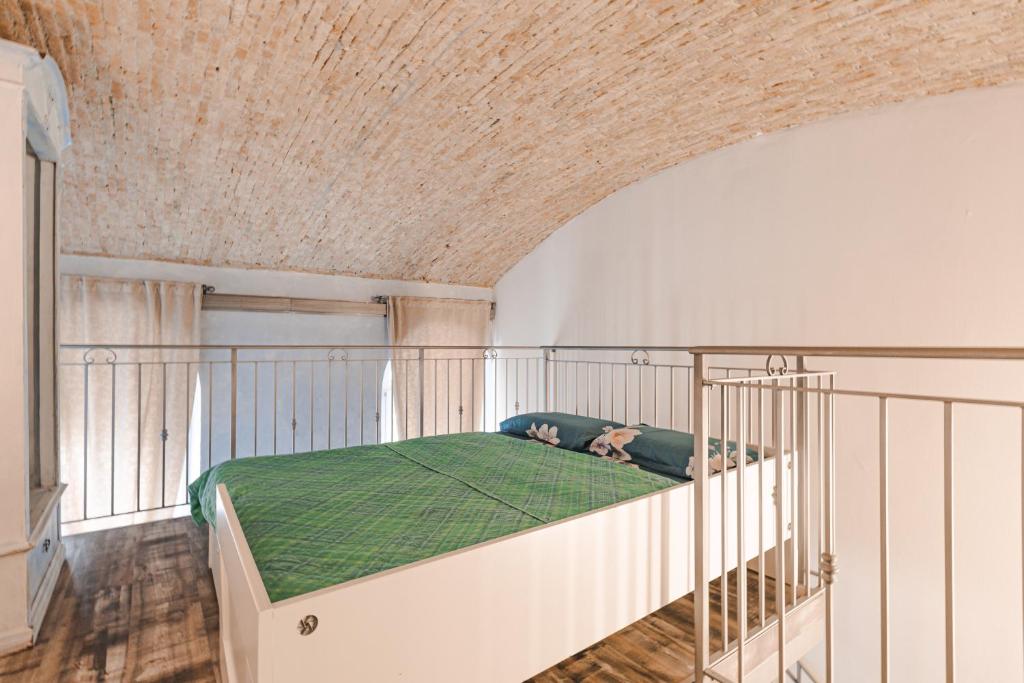 Posteľ alebo postele v izbe v ubytovaní Trieste Art Loft