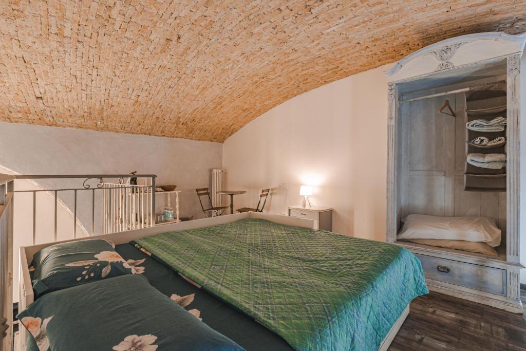 Posteľ alebo postele v izbe v ubytovaní Trieste Art Loft