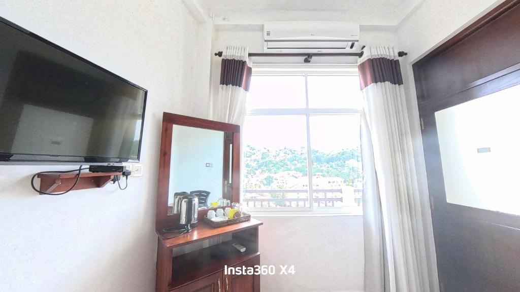 TV a/nebo společenská místnost v ubytování Terrace Kandy