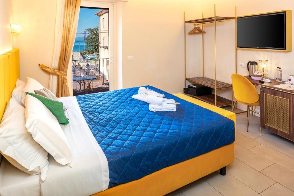 Postel nebo postele na pokoji v ubytování I Tre Re Rooms