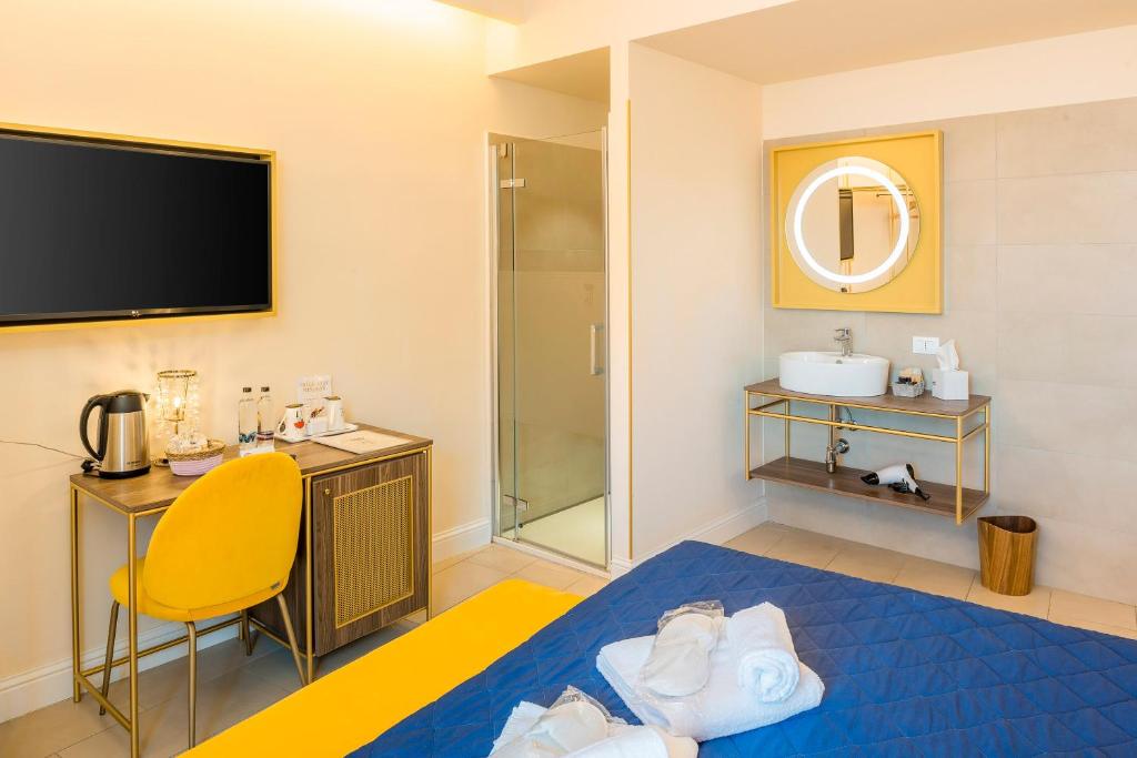 Postel nebo postele na pokoji v ubytování I Tre Re Rooms