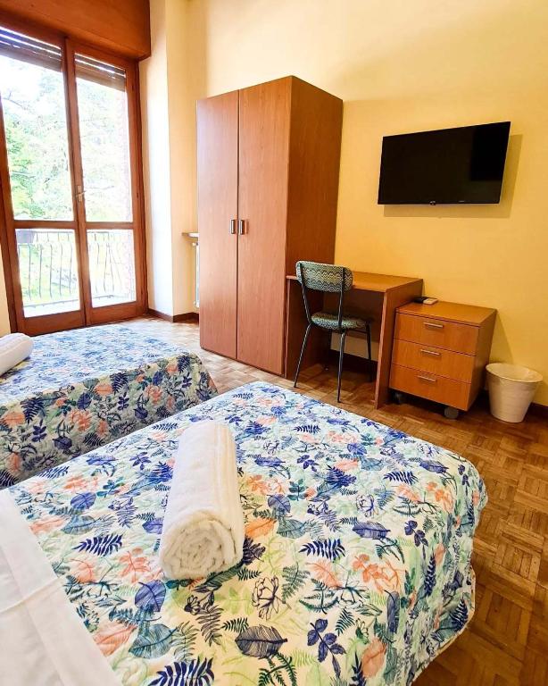 Postel nebo postele na pokoji v ubytování 4 Venti