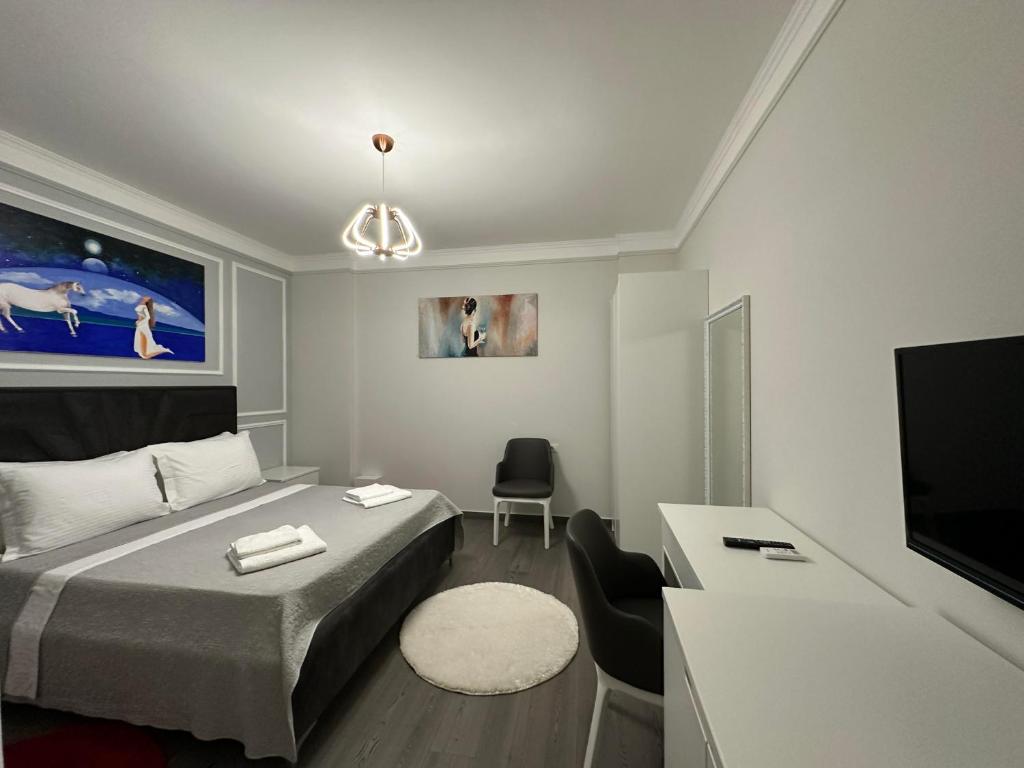 Postel nebo postele na pokoji v ubytování Hotel Imperiale