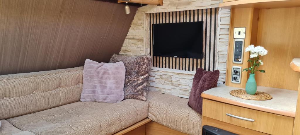 Posezení v ubytování Cara Cabin Self Catering Tiny Home