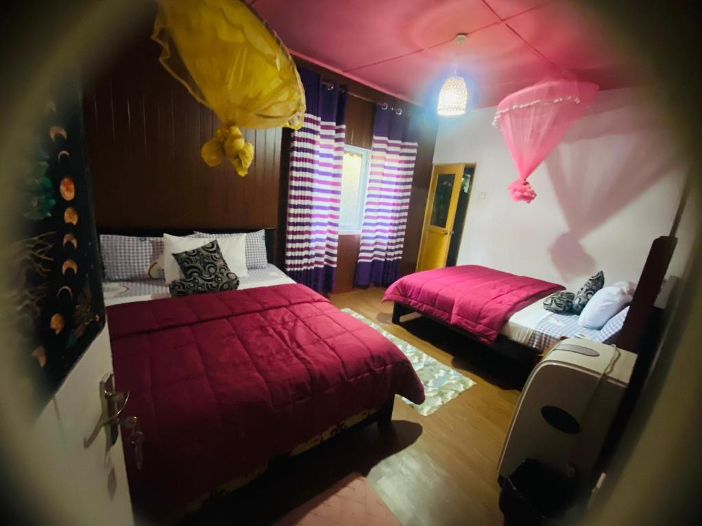 Postel nebo postele na pokoji v ubytování Tunnel Gap Homestay