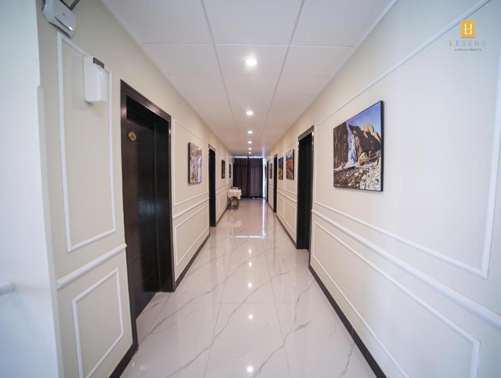 a corridor of a hospital with a hallway at Legend Hotel Skardu in Skardu