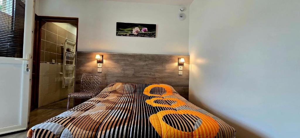 Postel nebo postele na pokoji v ubytování Hotel La Reserve