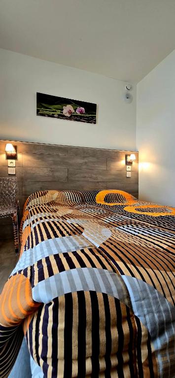 Postel nebo postele na pokoji v ubytování Hotel La Reserve