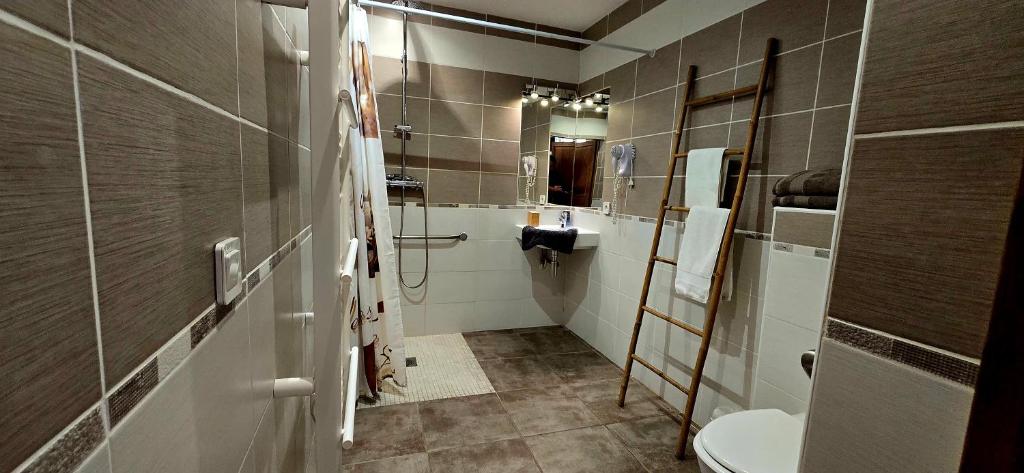Kuchyň nebo kuchyňský kout v ubytování Hotel La Reserve