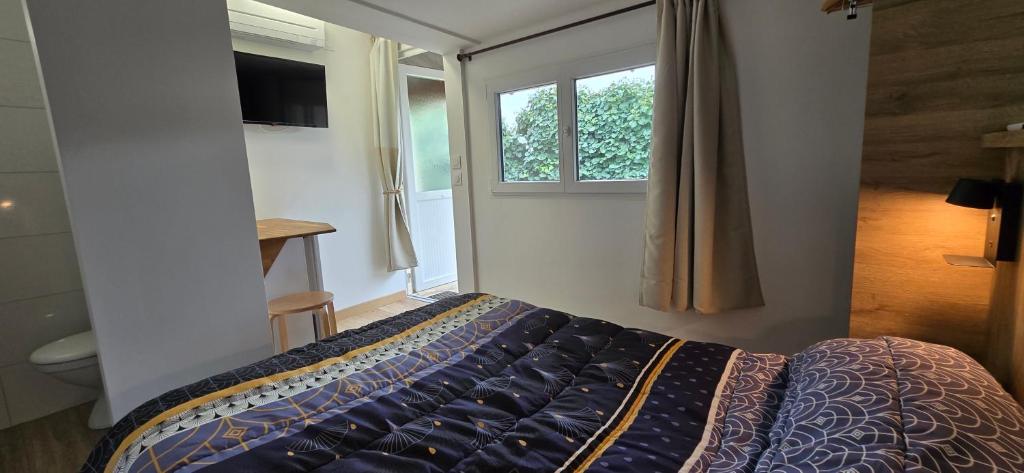 Postel nebo postele na pokoji v ubytování Hotel La Reserve