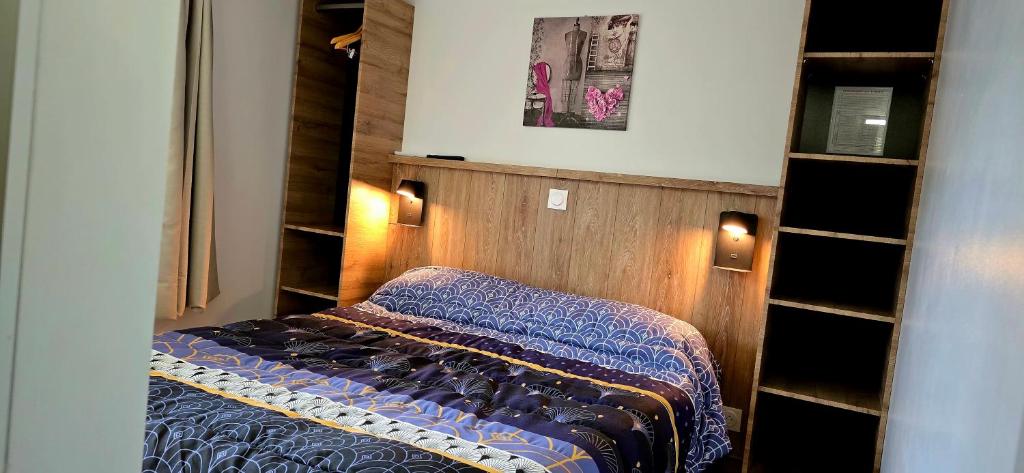 Postel nebo postele na pokoji v ubytování Hotel La Reserve