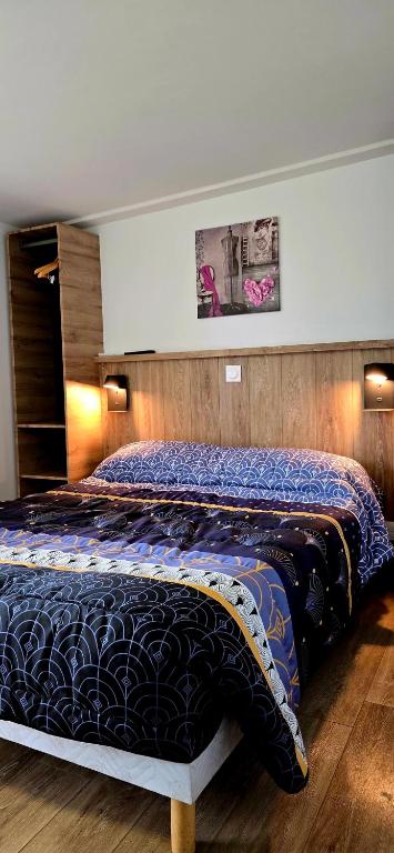 Postel nebo postele na pokoji v ubytování Hotel La Reserve