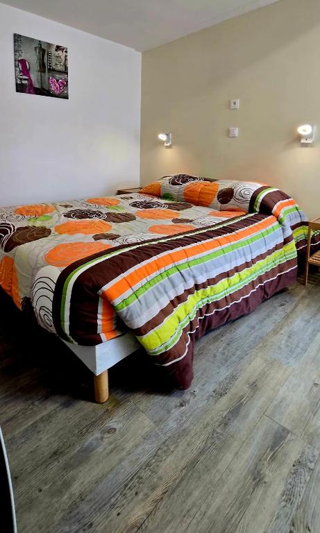 Postel nebo postele na pokoji v ubytování Hotel La Reserve
