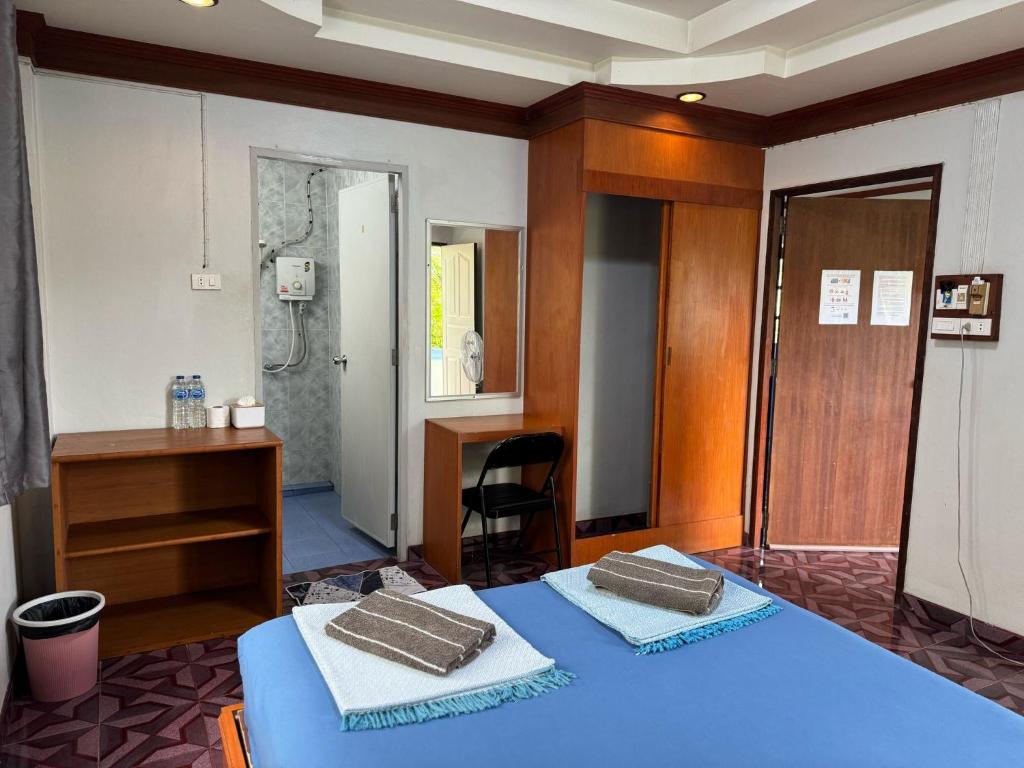 Postel nebo postele na pokoji v ubytování Tommy Resort Koh Tao