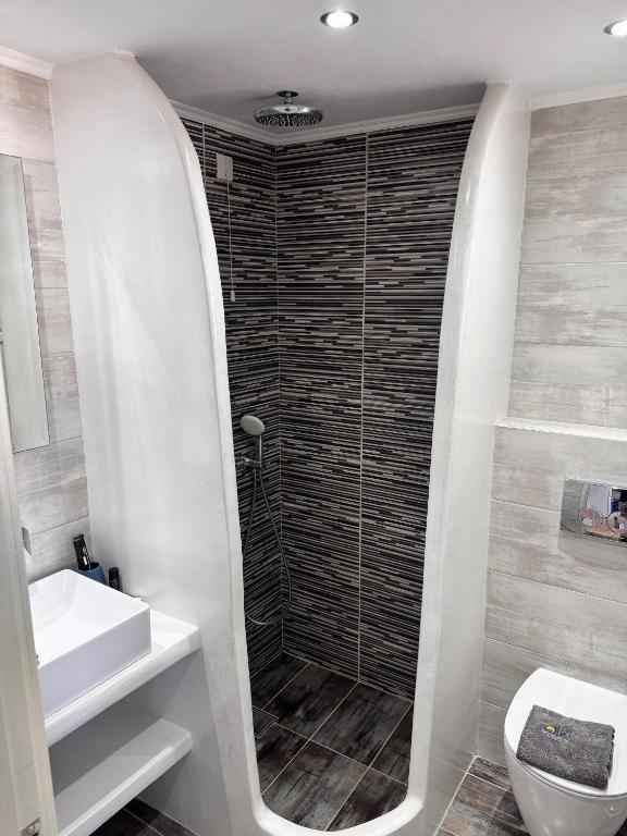 Koupelna v ubytování ALK Hotelᵀᴹ