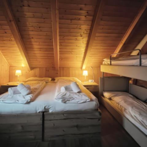 Posteľ alebo postele v izbe v ubytovaní Hotel Tarvisio Four Seasons