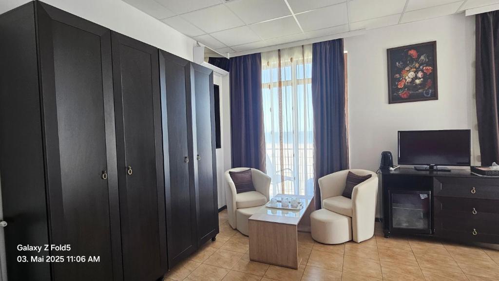 TV a/nebo společenská místnost v ubytování Hotel Solea Beach