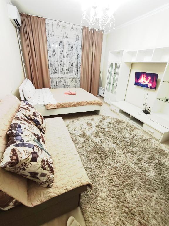 Llit o llits en una habitació de Марина 3