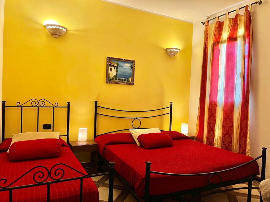 Postel nebo postele na pokoji v ubytování Agriturismo Molle