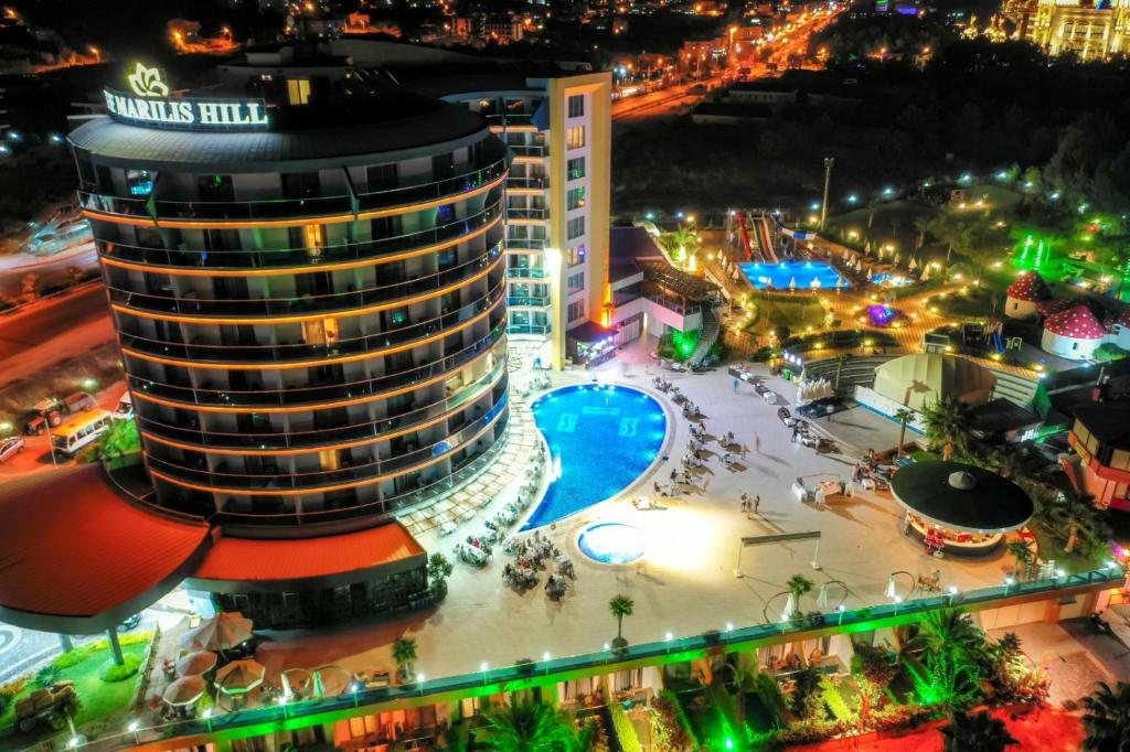 an aerial view of a city at night at The Marilis Hill Resort Hotel & Spa Ultra All Inclusive in Okurcalar