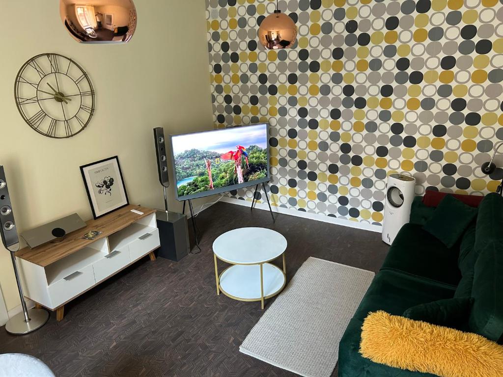 TV a/nebo společenská místnost v ubytování Mercur Residence