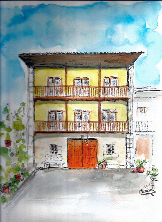 a painting of a building with a balcony at La Sierra del Aguanaz in Entrambasaguas
