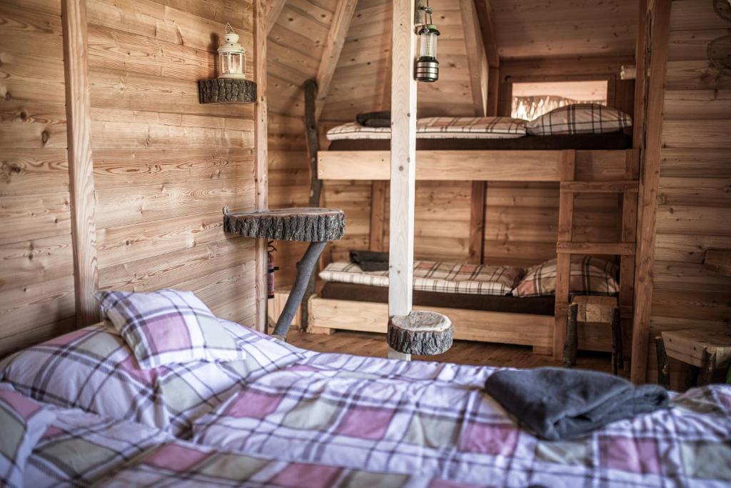 Postelja oz. postelje v sobi nastanitve Treehouse Šumava