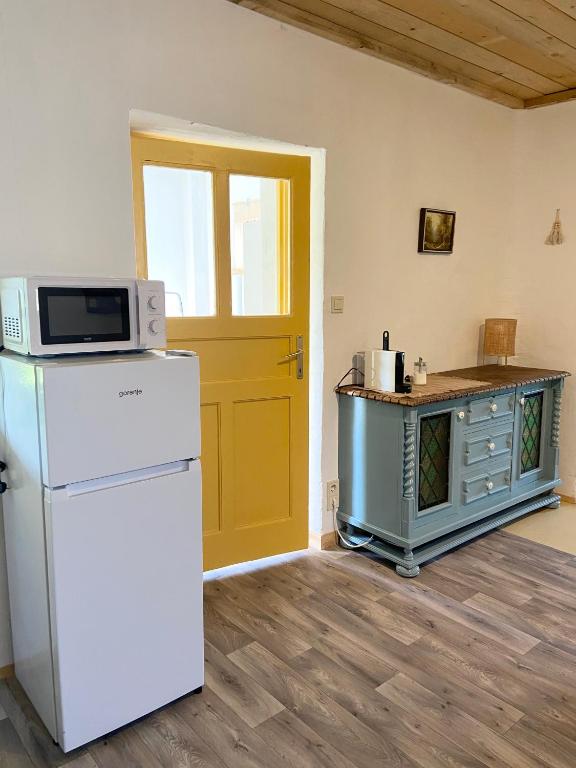Kuchyň nebo kuchyňský kout v ubytování Bánhiday J70 Beach House