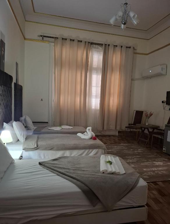 Postel nebo postele na pokoji v ubytování Pa la ce court