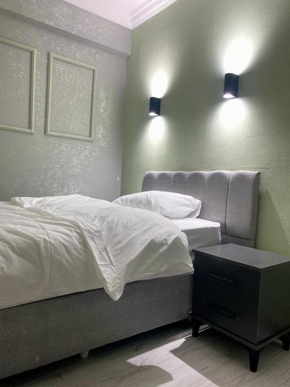 Postel nebo postele na pokoji v ubytování pasific otel