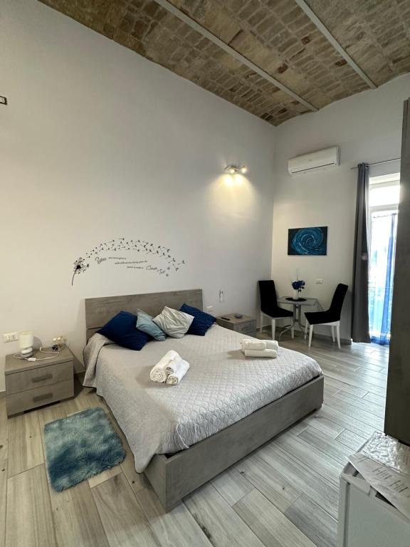 Postel nebo postele na pokoji v ubytování Il Tempio Pozzuoli B&B