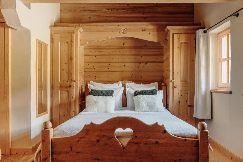 Postel nebo postele na pokoji v ubytování Le Chalet Hôtel Cordon Adults Only