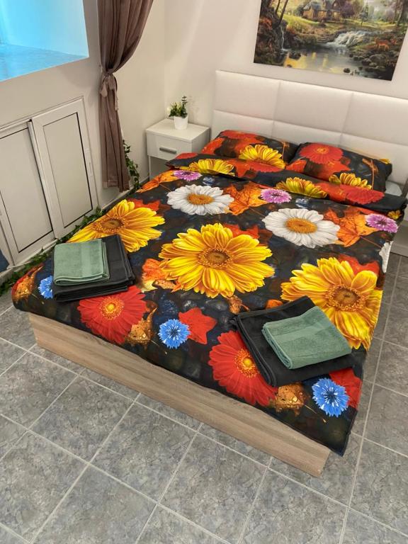 Ένα ή περισσότερα κρεβάτια σε δωμάτιο στο Sunrise Sea Garden