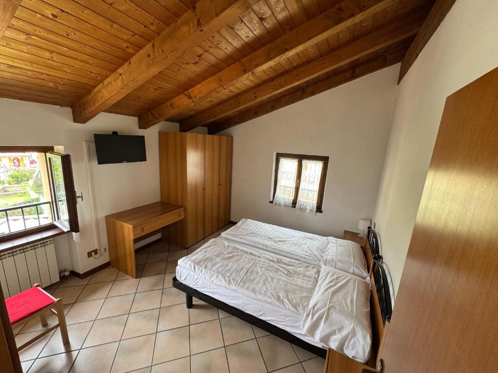 Postel nebo postele na pokoji v ubytování Hotel e Ristorante Cassone