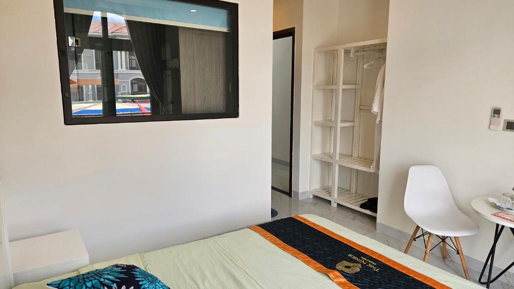 Кровать или кровати в номере ADRI Hotel