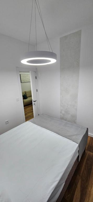 Postel nebo postele na pokoji v ubytování Bahr DELUX App & Suite