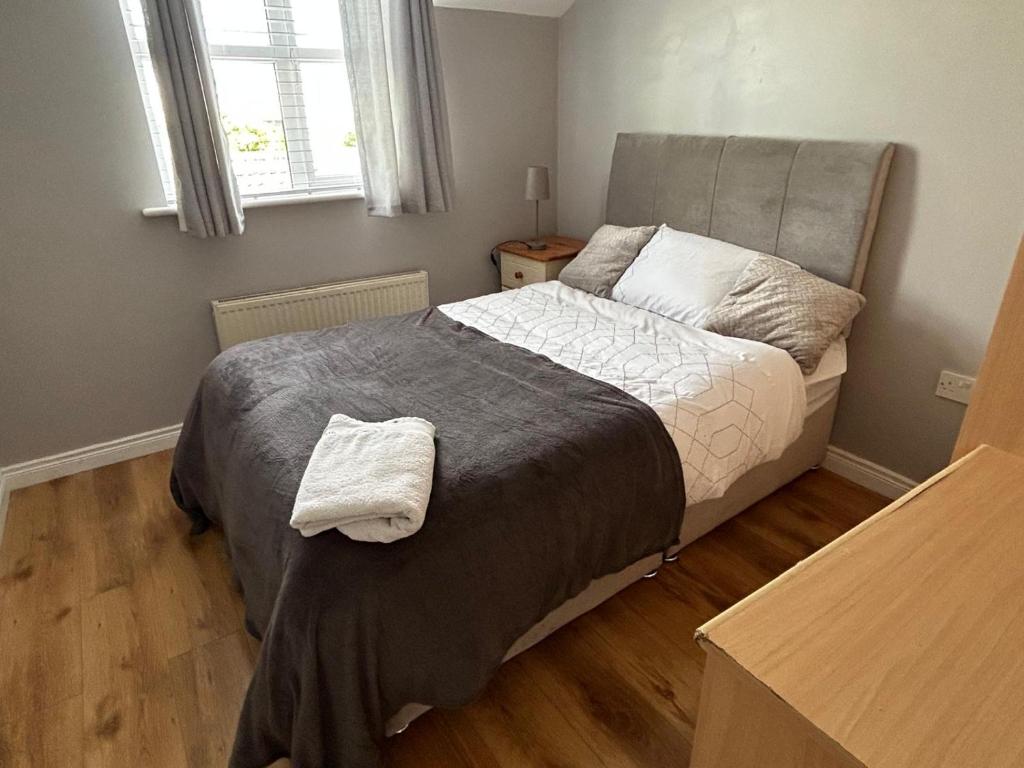Postel nebo postele na pokoji v ubytování Serene Home