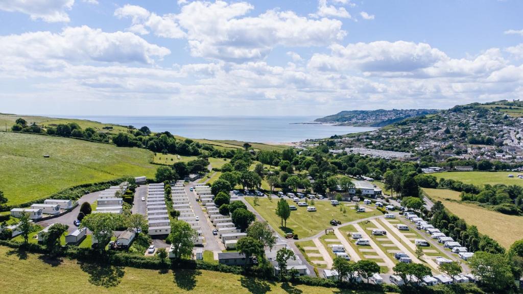 an aerial view of a parking lot next to the water at Newlands Holidays in Bridport