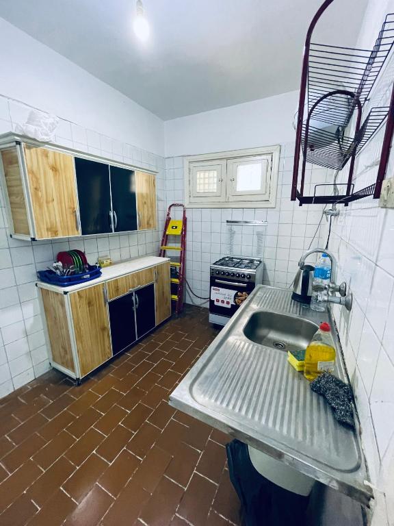 Kuchyň nebo kuchyňský kout v ubytování مدينة النورس بالإسماعيلية شقق وشاليهات