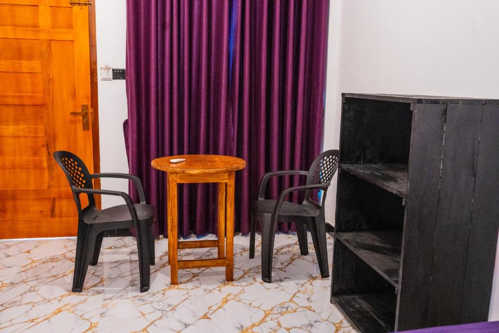 TV a/nebo společenská místnost v ubytování Hilton cottage inn
