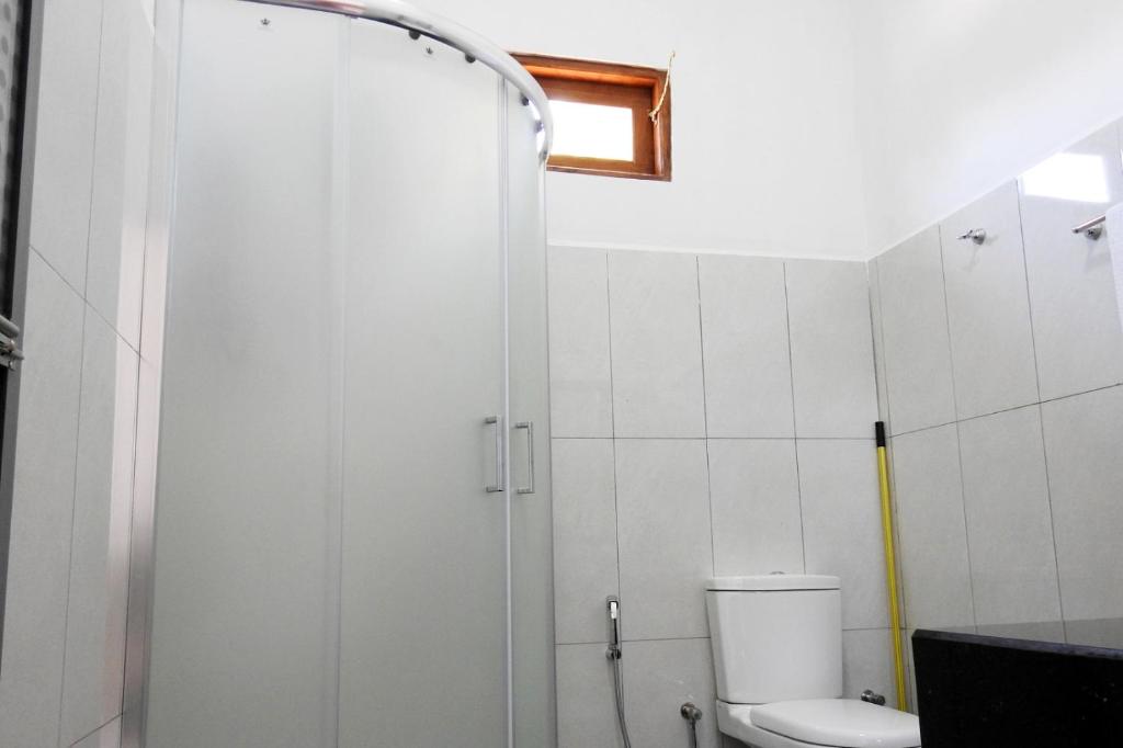 Koupelna v ubytování Coral Waves Inn Pasikuda