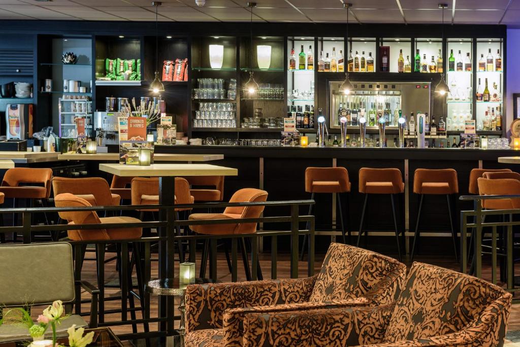 Lounge nebo bar v ubytování Parkhotel Tjaarda
