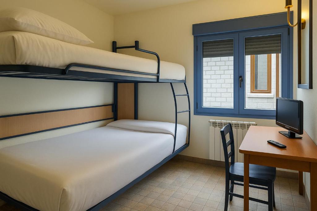 Postel nebo postele na pokoji v ubytování Hostal Nau Pradets