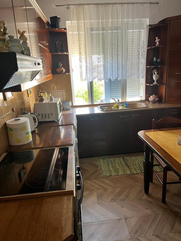 Kuchyň nebo kuchyňský kout v ubytování Berat Apartment Erifili